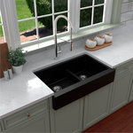 Karran USA - Karran Retrofit Farmhouse Quartz 34" Double Offset Bowl Sink, Black - This retrofit farmhouse design with its shorter 6-1/2" apron blends function and form beautifully, and will look incredible in your kitchen. It is designed with a shorter apron to allow it to simply install into a standard 36" wide sink base cabinet. This practical design is available in a selection of 6 elegant color choices to compliment any decor.