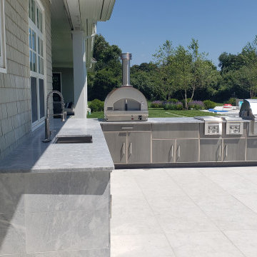 Resort like home boasts a resort like outdoor kitchen in BridgeHampton, NY