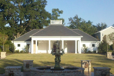 Huge traditional white one-story concrete fiberboard exterior home idea in New Orleans