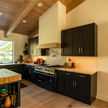 Rustic modern kitchen with custom plaster hood