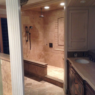 Custom Travertine shower with Schluter Line Drain