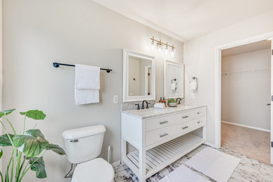 Mid-sized trendy master double-sink bathroom photo in Seattle with open cabinets, white cabinets and a freestanding vanity