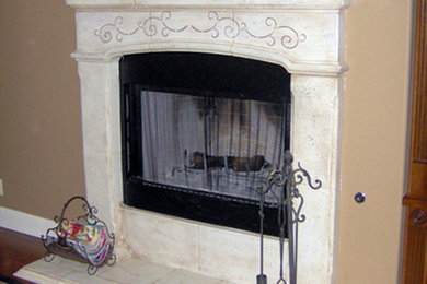 Stenciling over an Age Glaze/Color Wash adds warmth to a Cast Fireplace