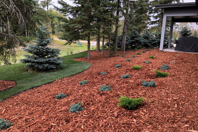 Design ideas for a mid-sized contemporary landscaping in Edmonton.