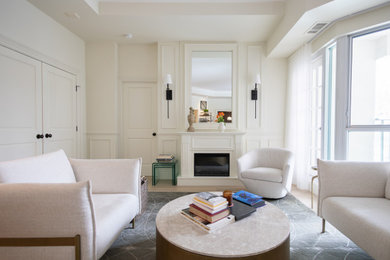 Living room - living room idea in Toronto with a standard fireplace