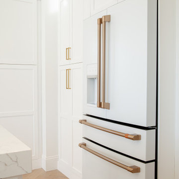 All White Transitional Kitchen with Herringbone Wood Floor