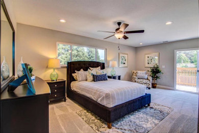 Inspiration for a large transitional master bedroom in Sacramento with grey walls, carpet, no fireplace and grey floor.