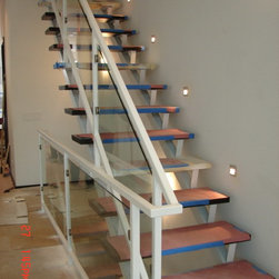 Steel stairs with glass panel - Products