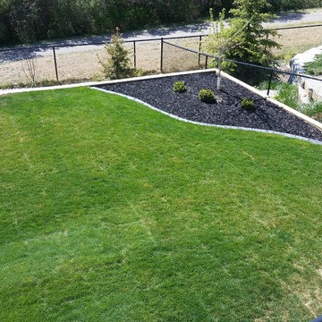 Calgary Landscaping & Exposed Concrete Watermark Rocky Ridge Bearspaw