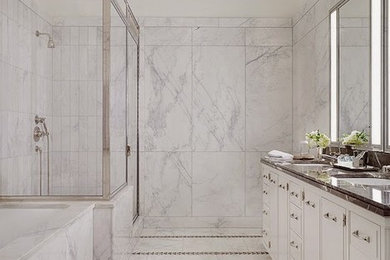 Example of a large transitional master white tile and marble tile marble floor bathroom design in New York with an undermount tub, white walls and marble countertops