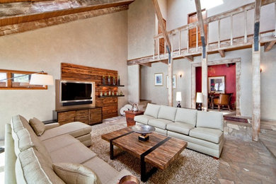 Example of a mountain style family room design in Other