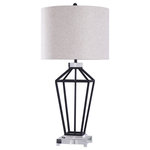 Harp and Finial - Windsor Table Lamp Painted Black Metal and Clear Crystal Textured Shade - The Windsor table lamp is crafted using a traditional lamp profile in a wholly contemporary way. Framed in an open cage style with black metal, this piece is set on a clear crystal base for a uniqueness that helps to define on-trend decor. Made with a round hardback fabric shade, this lamp is a delight on night stands and console tables alike.