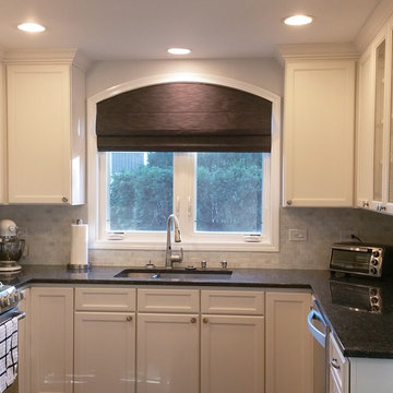 White Kitchen with Blue Pearl Granite Counters