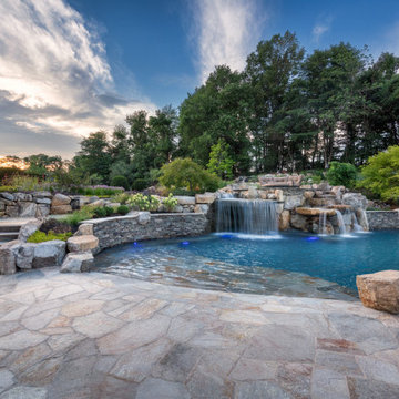 Natural Stone Pool Oasis by Liquidscapes & Garden Artisans