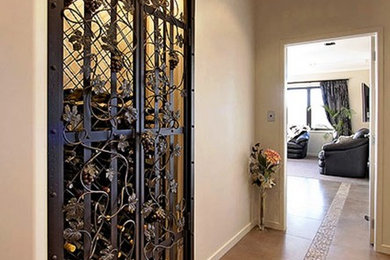 Example of a tuscan wine cellar design in Chicago
