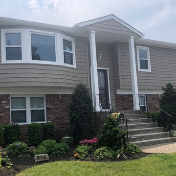 Farmingdale Siding - Tuscan Clay & Windows | Alpha Windows & Siding