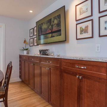 Modern Kitchen with White Flat Panel Shaker Cabinets & Natural Stone Backsplash