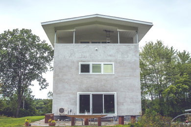 Example of a minimalist exterior home design in Boston