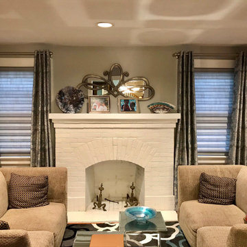 Custom patterned grommet drapery with grey Roman Shade Vignette.