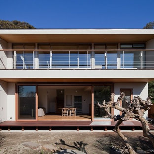 東京23区のコンテンポラリースタイルのおしゃれな白い家 (陸屋根) の写真