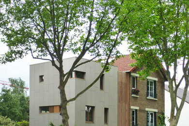 Cette photo montre une façade de maison tendance.