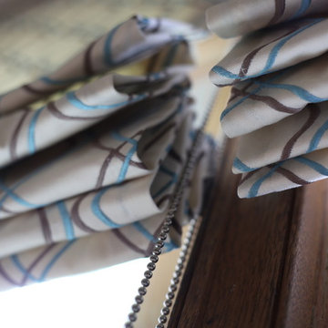 Classic master bedroom roman shades