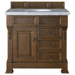 James Martin Vanities - Brookfield 36" Single Vanity, Country Oak w/ 3 CM Arctic Fall Solid Surface Top - The Brookfield 36" Country Oak vanity by James Martin Vanities features hand carved accenting filigrees and raised panel doors. One door opens to shelves for storage below. Two drawers made up of a lower double-height drawer and a middle standard drawer offer additional storage space. Antique brass finish door and drawer pulls. Matching wood backsplash is included. The look is completed with a 3cm eased edge Arctic Fall Solid Surface top with a white porcelain rectangular sink.