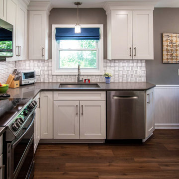 White Kitchen with White Tile Backsplash and Quartz Countertop