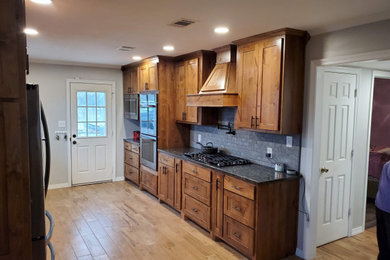 Example of an arts and crafts kitchen design in Dallas