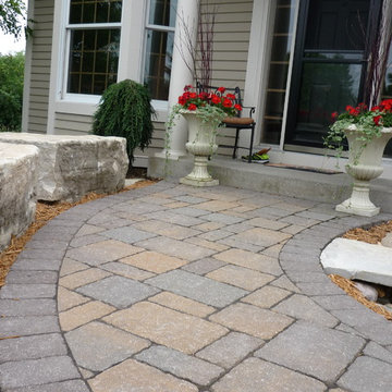 Front Paver Sidewalk with Sitting Area and Dry Stream