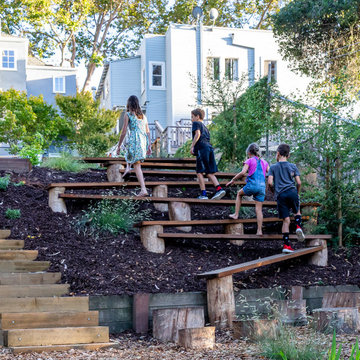 Reclaimed wood planks and stumps offer alternative route up hillside