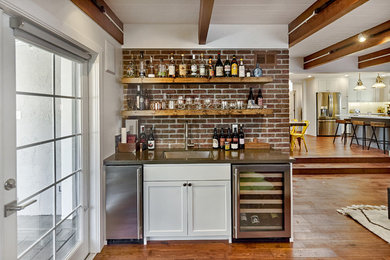 Transitional single-wall medium tone wood floor wet bar photo in San Francisco with an undermount sink, shaker cabinets, white cabinets and brick backsplash