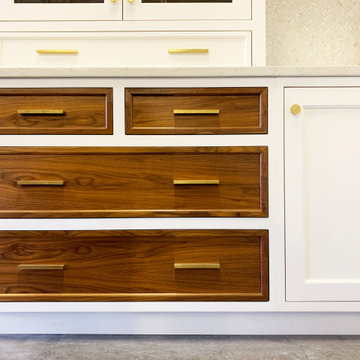 White Kitchen with Walnut features and Brass Accents