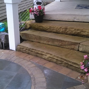 sandstone steps with bluestone/brick paver landing