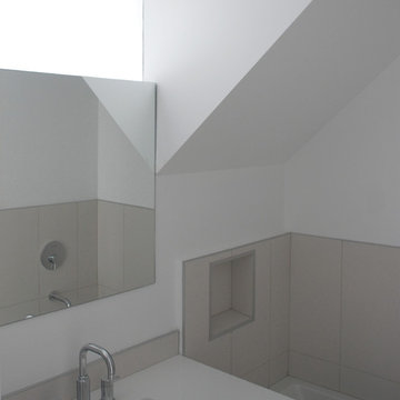 4-pc bathroom borrows light from staircase