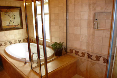 Mid-sized tuscan master beige tile bathroom photo in Portland with an undermount sink, marble countertops, a two-piece toilet and beige walls