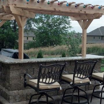 Paver Patio, Grill Enclosure, Outdoor Living Space, Rock Bubbler and Fire Pit