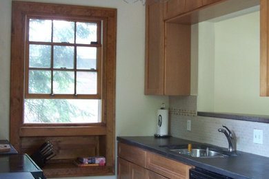 Enclosed kitchen - small contemporary galley enclosed kitchen idea in Cincinnati with recessed-panel cabinets and no island