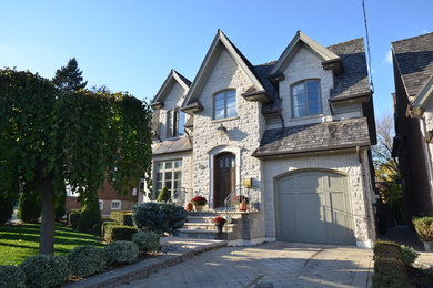 Example of an exterior home design in Toronto