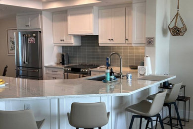 Beach style kitchen photo in Miami