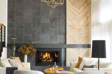 Example of a mid-sized minimalist loft-style dark wood floor living room design in Denver with white walls, a tile fireplace and a concealed tv