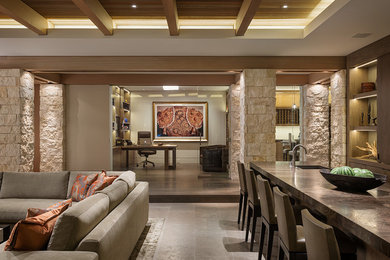 Inspiration for a contemporary open concept family room in Orange County with beige walls.