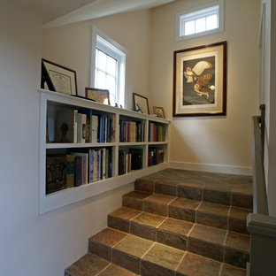 This is an example of a medium sized traditional straight staircase in Boston with slate treads and slate risers.