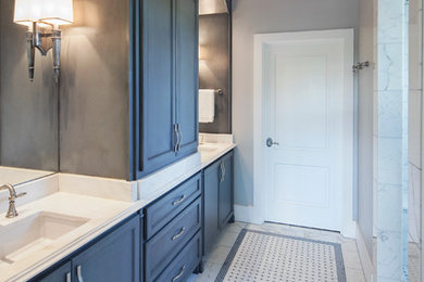 This is an example of a transitional master bathroom in Austin with an undermount sink, marble benchtops, white tile, mosaic tile, grey walls and marble floors.
