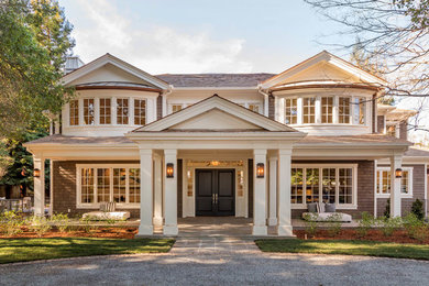 Elegant gray two-story wood house exterior photo in San Francisco with a hip roof and a shingle roof