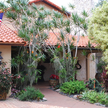 Facade flanked by orchids