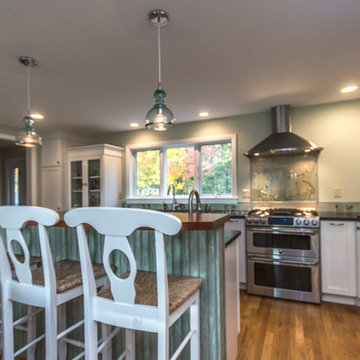 White Kitchen with Custom Hand-made Art Tiles