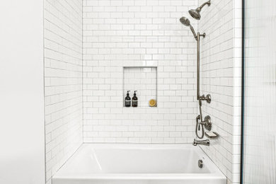 Bathroom - mid-century modern white tile and ceramic tile cement tile floor and black floor bathroom idea in Portland with white walls