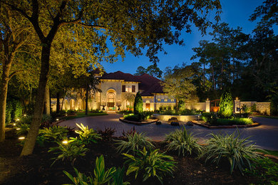 Design ideas for a huge mediterranean front yard landscaping in Houston.