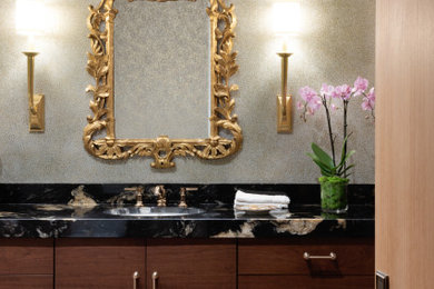 Example of a transitional powder room design in Other
